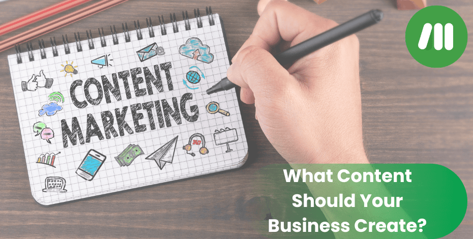 A person has scribbled "Content Marketing" on an open notepad. Momentum's logo is in the top right. The text "What content should your business create?" is on the bottom right
